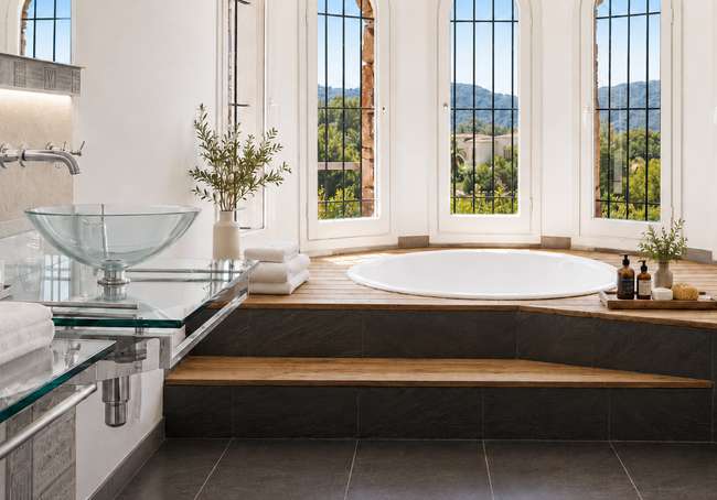 Master bathroom with arched windows