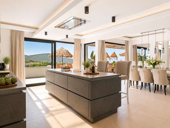 Contemporary kitchen opening to terrace