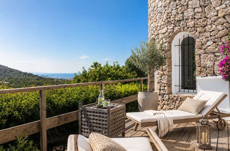 Stone-clad terrace with sea view